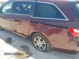 2012 Honda Odyssey EX с VIN 5FNRL5H40CB047070, выставлен на аукционе IAAI как лот 41817134 с пробегом 141 978 миль миль и . История ставок и продаж доступна на DreamBid. Изображение 6.