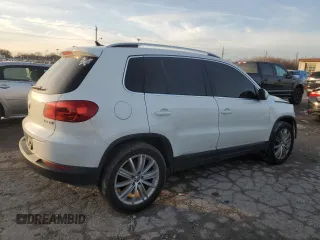 2014 Volkswagen Tiguan SEL с VIN WVGAV3AX2EW552280, выставлен на аукционе Copart как лот 85222224 с пробегом 109 761 миль миль и Списание • Salvage title. История ставок и продаж доступна на DreamBid. Изображение 3.