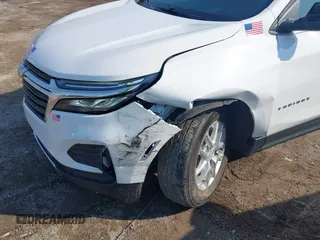 2022 Chevrolet Equinox LT with VIN 3GNAXKEV4NL237107, listed as a IAAI auction lot 41949948 with 23,113 mi miles and . Bid and sale history available at DreamBid. Image 6.