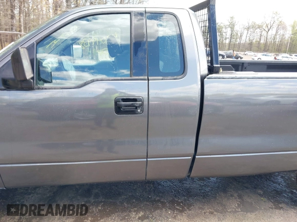 2004 Ford F-150 XL with VIN 1FTRF12W14NB89702, listed as a IAAI auction lot 42049938 with 106,379 mi miles. Bid and sale history available at carsss.com. Image 14.