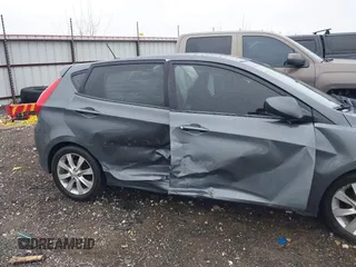 2012 Hyundai Accent SE with VIN KMHCU5AE9CU013458, listed as a IAAI auction lot 41475986 with 88,592 mi miles. Bid and sale history available at carsss.com. Image 6.