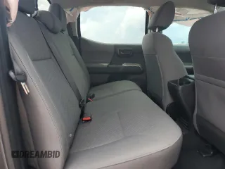 2022 Toyota Tacoma SR with VIN 3TYAX5GN9NT038043, listed as a Copart auction lot 55555025 with 31,648 mi miles and Salvage title. Bid and sale history available at DreamBid. Image 10.