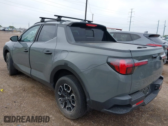 2023 Hyundai Santa Cruz SEL z VIN 5NTJCDAE6PH041342, wystawiony jako IAAI lot #42192227 z przebiegiem Nie podano mil oraz . Historia ofert i sprzedaży dostępna na DreamBid. Obrazek 3.