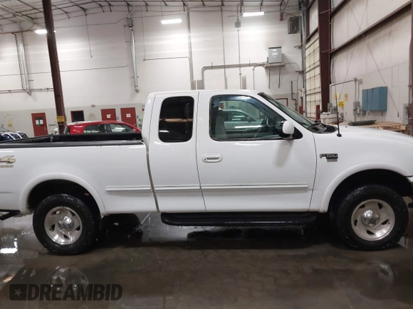 1998 Ford F-150 с VIN 1FTRX18L1WKB99239, выставлен на аукционе IAAI как лот 41987823 с пробегом 217 930 миль миль и . История ставок и продаж доступна на DreamBid. Изображение 13.