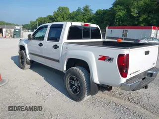 2007 Chevrolet Colorado 1LT z VIN 1GCDT13E978249656, wystawiony jako IAAI lot #42445862 z przebiegiem 115 298 mil mil oraz . Historia ofert i sprzedaży dostępna na DreamBid. Obrazek 3.