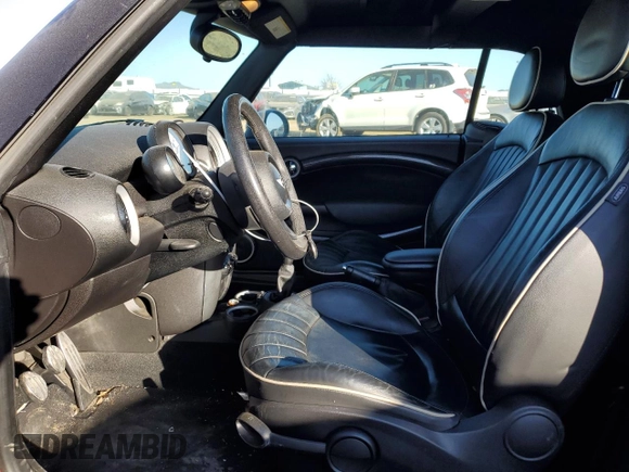 2014 MINI Convertible S with VIN WMWZP3C54ET298129, listed as a Copart auction lot 88523065 with 54,788 mi miles and Salvage title. Bid and sale history available at DreamBid. Image 7.