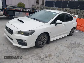 2015 Subaru WRX with VIN JF1VA1A67F9819707, listed as a IAAI auction lot 42021831 with 104,706 mi miles. Bid and sale history available at carsss.com. Image 2.