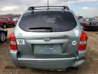2009 Hyundai Tucson GLS with VIN KM8JM12B89U040907, listed as a Copart auction lot 50048415 with 130,851 mi miles and Salvage Title. Bid and sale history available at carsss.com. Image 6.