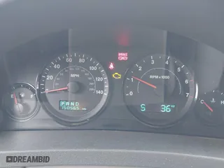 2005 Jeep Grand Cherokee Laredo with VIN 1J4GR48K35C702010, listed as a IAAI auction lot 41043017 with 150,565 mi miles. Bid and sale history available at carsss.com. Image 7.