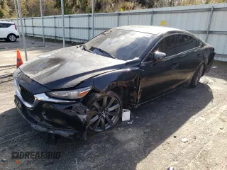 2021 Mazda Mazda6 Touring with VIN JM1GL1VM6M1602702, listed as a Copart auction lot 42879215 with 82,807 mi miles and Salvage Title. Bid and sale history available at carsss.com. Image 1.