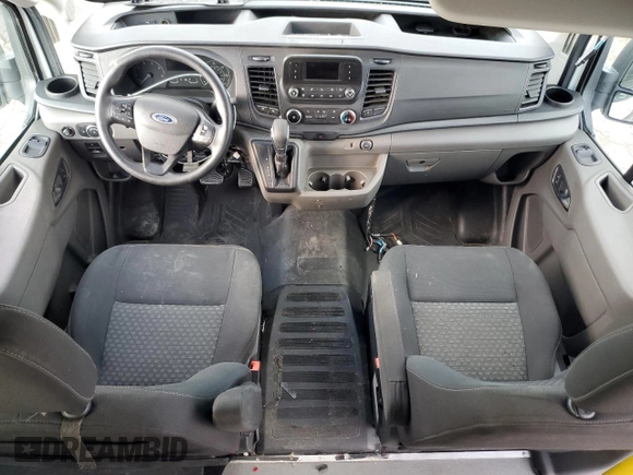 2021 Ford Transit with VIN 1FDAX2CG2MKA23709, listed as a Copart auction lot 74054214 with 105,503 mi miles and Salvage Title. Bid and sale history available at DreamBid. Image 8.