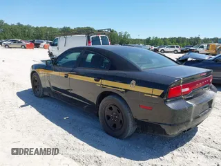 2014 Dodge Charger Police with VIN 2C3CDXAT1EH367015, listed as a IAAI auction lot 42136195 with 121,536 mi miles and . Bid and sale history available at DreamBid. Image 3.