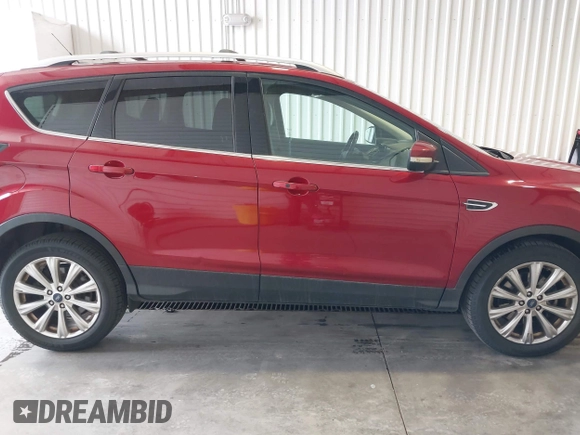 2017 Ford Escape Titanium with VIN 1FMCU9J91HUA32264, listed as a IAAI auction lot 42050273 with 201,128 mi miles. Bid and sale history available at carsss.com. Image 13.