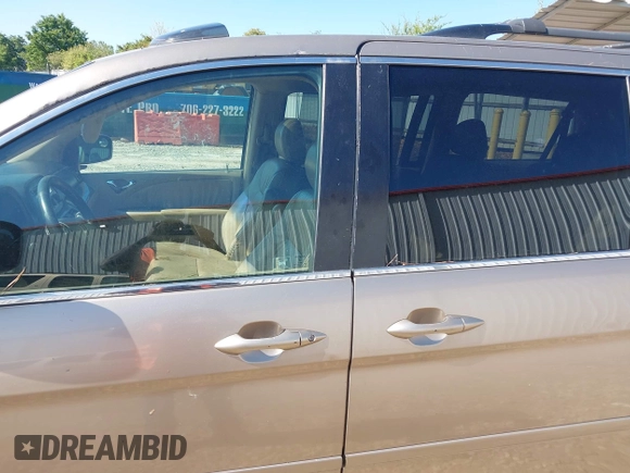 2006 Honda Odyssey EX-L with VIN 5FNRL38666B410188, listed as a IAAI auction lot 42004957 with 156,584 mi miles. Bid and sale history available at carsss.com. Image 14.