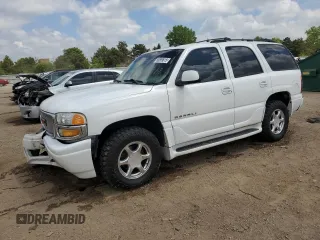 2003 GMC Yukon Denali z VIN 1GKEK63U33J316027, wystawiony jako Copart lot #56869815 z przebiegiem 200 916 mil mil oraz Szkoda całkowita • Salvage title. Historia ofert i sprzedaży dostępna na DreamBid. Obrazek 1.
