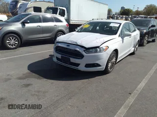 2016 Ford Fusion Titanium with VIN 3FA6P0K93GR347016, listed as a IAAI auction lot 41850780 with 215,872 mi miles and . Bid and sale history available at carsss.com. Image 2.