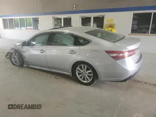 2013 Toyota Avalon XLE with VIN 4T1BK1EB0DU001291, listed as a Copart auction lot 54129175 with 107,242 mi miles and Salvage Title. Bid and sale history available at DreamBid. Image 2.