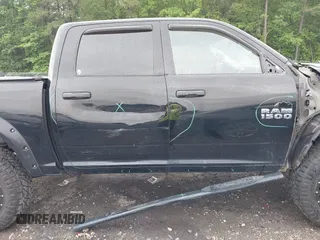 2014 Ram 1500 Express z VIN 1C6RR7KT9ES162080, wystawiony jako IAAI lot #42236759 z przebiegiem 147 216 mil mil oraz . Historia ofert i sprzedaży dostępna na DreamBid. Obrazek 14.