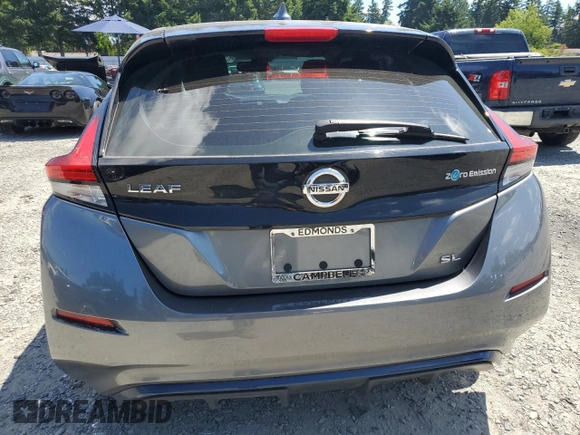 2018 Nissan LEAF SV with VIN 1N4AZ1CP4JC305144, listed as a Copart auction lot 63092295 with 49,729 mi miles and Clean title. Bid and sale history available at DreamBid. Image 6.