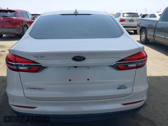 2020 Ford Fusion SE with VIN 3FA6P0LU9LR227928, listed as a IAAI auction lot 42445186 with 59,431 mi miles and . Bid and sale history available at DreamBid. Image 16.