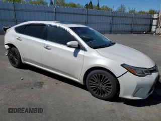 2016 Toyota Avalon Limited with VIN 4T1BK1EBXGU199365, listed as a Copart auction lot 51663095 with 141,066 mi miles and Salvage Title. Bid and sale history available at DreamBid. Image 4.