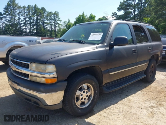 2004 Chevrolet Tahoe LS z VIN 1GNEC13V74R295259, wystawiony jako IAAI lot #42339839 z przebiegiem 264 778 mil mil oraz . Historia ofert i sprzedaży dostępna na DreamBid. Obrazek 2.