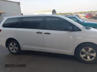 2015 Toyota Sienna L with VIN 5TDZK3DC5FS657115, listed as a IAAI auction lot 42109678 with 176,995 mi miles. Bid and sale history available at carsss.com. Image 13.