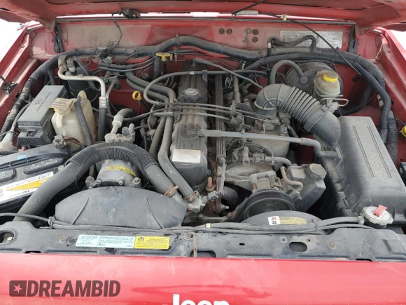 1999 Jeep Cherokee Sport with VIN 1J4FF68S3XL667570, listed as a Copart auction lot 52821105 with 173,712 mi miles and Salvage Title. Bid and sale history available at DreamBid. Image 11.