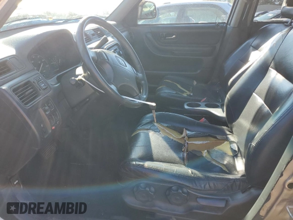 2000 Honda CR-V SE with VIN JHLRD1877YC048496, listed as a Copart auction lot 83595874 with 114,099 mi miles and Salvage Title. Bid and sale history available at carsss.com. Image 7.