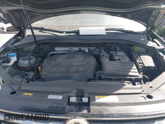 2021 Volkswagen Tiguan S with VIN 3VV1B7AX6MM027114, listed as a IAAI auction lot 41778035 with 81,075 mi miles and . Bid and sale history available at DreamBid. Image 10.