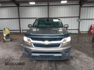 2015 Chevrolet Colorado 2WD WT z VIN 1GCGSAE34F1270479, wystawiony jako IAAI lot #41768612 z przebiegiem 158 984 mil mil oraz . Historia ofert i sprzedaży dostępna na DreamBid. Obrazek 12.
