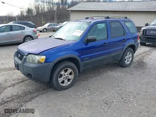 2006 Ford Escape XLT with VIN 1FMYU03146KB87070, listed as a IAAI auction lot 41451676 with 180,415 mi miles. Bid and sale history available at carsss.com. Image 2.