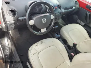 2010 Volkswagen Beetle Final Edition with VIN 3VWRW3AL6AM008857, listed as a Copart auction lot 64312235 with 104,318 mi miles and Salvage title. Bid and sale history available at DreamBid. Image 8.