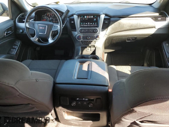 2019 GMC Yukon SLE with VIN 1GKS2AKC4KR334387, listed as a Copart auction lot 77267774 with 62,821 mi miles and Salvage Title. Bid and sale history available at carsss.com. Image 8.
