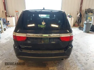 2012 Dodge Durango SXT with VIN 1C4RDJAG9CC169871, listed as a IAAI auction lot 42558583 with 259,113 mi miles and . Bid and sale history available at DreamBid. Image 16.