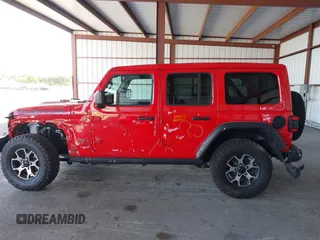 2021 Jeep Wrangler Unlimited Rubicon z VIN 1C4HJXFG8MW785318, wystawiony jako IAAI lot #42118969 z przebiegiem 61 572 mil mil oraz . Historia ofert i sprzedaży dostępna na DreamBid. Obrazek 14.