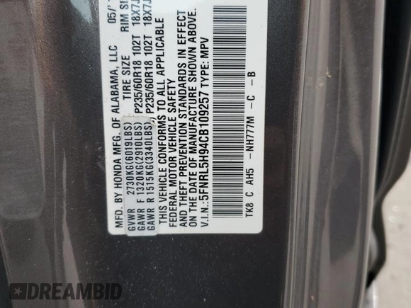 2012 Honda Odyssey Touring with VIN 5FNRL5H94CB109257, listed as a Copart auction lot 59636075 with 107,543 mi miles and Salvage title. Bid and sale history available at DreamBid. Image 13.