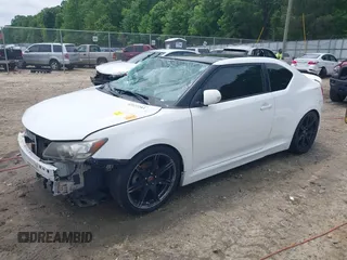 2011 Scion tC z VIN JTKJF5C75B3010638, wystawiony jako IAAI lot #42127293 z przebiegiem 149 320 mil mil oraz . Historia ofert i sprzedaży dostępna na DreamBid. Obrazek 18.