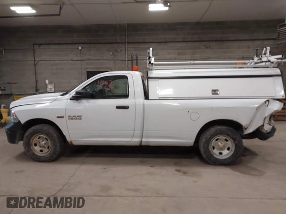 2015 Ram 1500 Tradesman with VIN 3C6JR7DT5FG660649, listed as a IAAI auction lot 41672656 with 156,189 mi miles and . Bid and sale history available at DreamBid. Image 13.