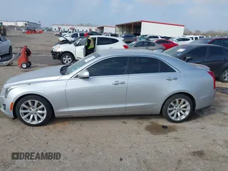 2018 Cadillac ATS RWD z VIN 1G6AA5RX5J0178702, wystawiony jako IAAI lot #41522724 z przebiegiem 79 502 mil mil oraz . Historia ofert i sprzedaży dostępna na DreamBid. Obrazek 14.