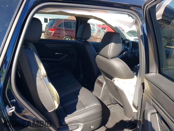 2024 Mazda CX-90 Select z VIN JM3KKAHDXR1170154, wystawiony jako IAAI lot #40852871 z przebiegiem 4 498 mil mil oraz . Historia ofert i sprzedaży dostępna na DreamBid. Obrazek 8.