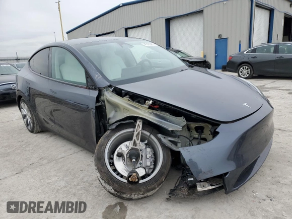 2023 Tesla Model Y Long Range z VIN 7SAYGDEE8PF884567, wystawiony jako Copart lot #45181465 z przebiegiem 16 653 mil mil oraz Szkoda całkowita • Salvage title. Historia ofert i sprzedaży dostępna na DreamBid. Obrazek 4.