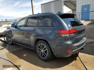 2018 Jeep Grand Cherokee Trailhawk with VIN 1C4RJFLT6JC328715, listed as a Copart auction lot 49987175 with 105,515 mi miles and Salvage Title. Bid and sale history available at carsss.com. Image 2.