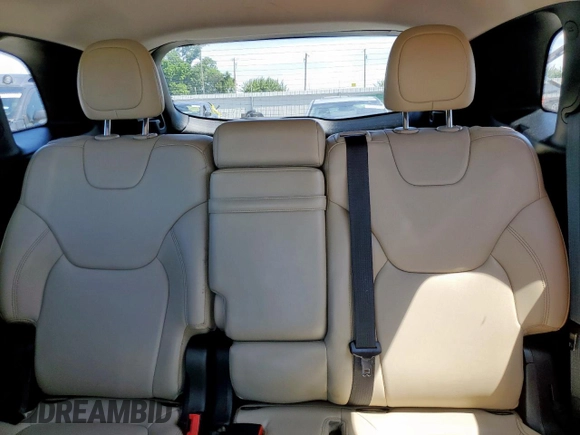 2018 Jeep Cherokee Limited z VIN 1C4PJLDX4JD556701, wystawiony jako Copart lot #58723505 z przebiegiem Nie podano mil oraz Szkoda całkowita • Salvage title. Historia ofert i sprzedaży dostępna na DreamBid. Obrazek 10.