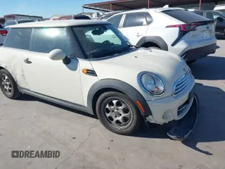 2012 MINI Hardtop with VIN WMWSU3C54CT261914, listed as a IAAI auction lot 41816390 with 118,647 mi miles and . Bid and sale history available at DreamBid. Image 1.