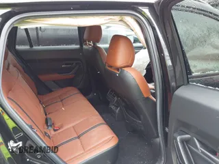 2024 Mazda CX-50 Premium z VIN 7MMVABDYXRN180263, wystawiony jako IAAI lot #41738791 z przebiegiem 9 688 mil mil oraz . Historia ofert i sprzedaży dostępna na DreamBid. Obrazek 8.