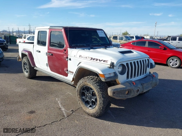 2022 Jeep Gladiator Mojave with VIN 1C6JJTEG6NL100383, listed as a IAAI auction lot 40712989 with 35,283 mi miles. Bid and sale history available at carsss.com. Image 1.