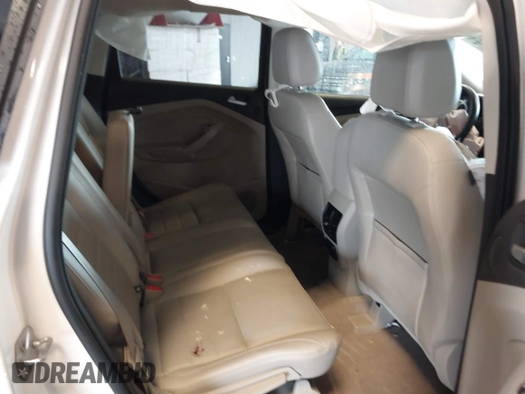 2016 Ford Escape Titanium with VIN 1FMCU9J90GUA18743, listed as a IAAI auction lot 42419730 with 102,666 mi miles and . Bid and sale history available at DreamBid. Image 8.