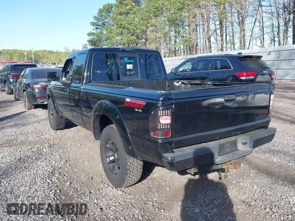 2011 Ford Ranger XLT with VIN 1FTLR4FE9BPB07796, listed as a IAAI auction lot 42128597 with 235,512 mi miles. Bid and sale history available at carsss.com. Image 3.