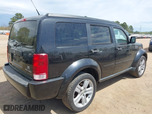 2011 Dodge Nitro Heat with VIN 1D4PT4GX2BW554188, listed as a IAAI auction lot 41882423 with 167,039 mi miles and . Bid and sale history available at DreamBid. Image 4.